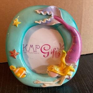 Ceramic picture frame decorated with  a mermaid, fish and starfish. K148